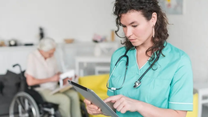 Medical professional managing compliance documentation for prosthetics care